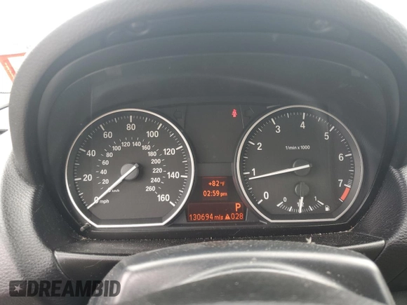 2009 BMW 1 Series 128i with VIN WBAUN13559VH80948, listed as a Copart auction lot 73012384 with 130,694 mi miles and Clean Title. Bid and sale history available at carsss.com. Image 9.