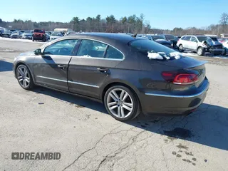 2013 Volkswagen CC Lux with VIN WVWRP7ANXDE522469, listed as a IAAI auction lot 41413025 with 115,117 mi miles. Bid and sale history available at carsss.com. Image 3.