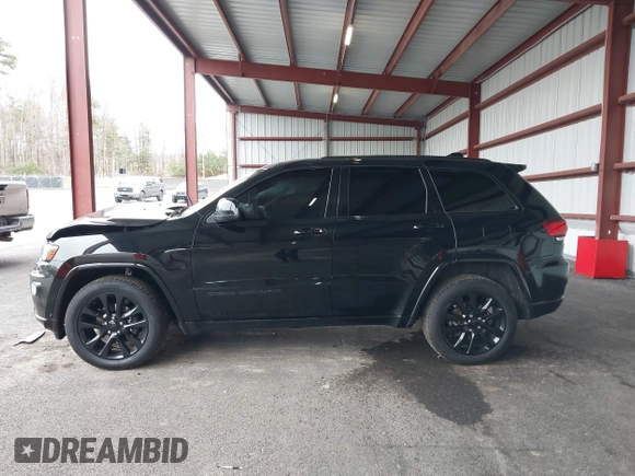 2019 Jeep Grand Cherokee Laredo E with VIN 1C4RJFAG0KC565739, listed as a IAAI auction lot 42039038 with 103,358 mi miles and . Bid and sale history available at DreamBid. Image 14.