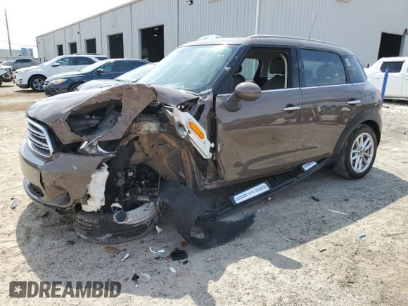 2015 MINI Countryman with VIN WMWZB3C55FWR46334, listed as a Copart auction lot 55421795 with 33,135 mi miles and Salvage Title. Bid and sale history available at DreamBid. Image 1.
