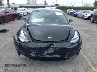 2018 Tesla Model 3 Long Range Battery with VIN 5YJ3E1EA9JF009384, listed as a IAAI auction lot 41544624 with 66,896 mi miles and . Bid and sale history available at DreamBid. Image 12.