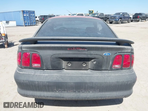 1997 Ford Mustang with VIN 1FALP4044VF195081, listed as a IAAI auction lot 41725150 with 124,009 mi miles. Bid and sale history available at carsss.com. Image 16.