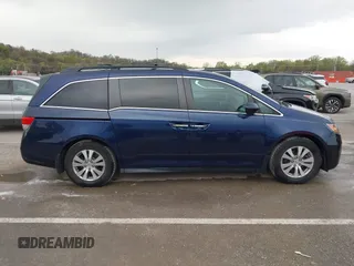 2014 Honda Odyssey EX-L with VIN 5FNRL5H68EB049914, listed as a IAAI auction lot 41986894 with 125,222 mi miles and . Bid and sale history available at carsss.com. Image 13.