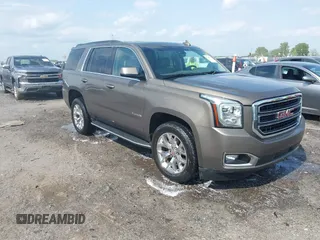 2016 GMC Yukon SLT with VIN 1GKS1BKC9GR328861, listed as a IAAI auction lot 42010839 with 200,711 mi miles. Bid and sale history available at carsss.com. Image 1.