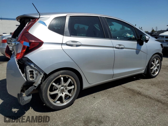 2015 Honda Fit EX-L z VIN 3HGGK5H86FM712830, wystawiony jako Copart lot #56429325 z przebiegiem 150 397 mil mil oraz Szkoda całkowita • Salvage title. Historia ofert i sprzedaży dostępna na DreamBid. Obrazek 3.