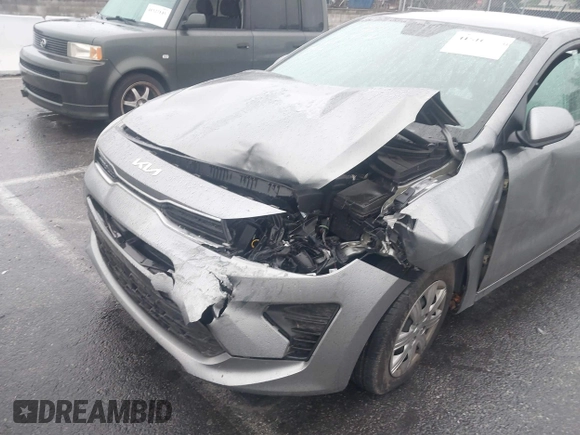 2022 Kia Rio S with VIN 3KPA25AD9NE500847, listed as a IAAI auction lot 41516061 with 38,828 mi miles and . Bid and sale history available at DreamBid. Image 6.