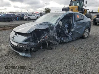 2012 Mazda 3 i Grand Touring with VIN JM1BL1W83C1658817, listed as a Copart auction lot 56818015 with Not provided miles and Salvage title. Bid and sale history available at DreamBid. Image 1.