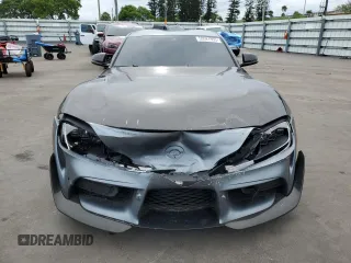 2022 Toyota Supra 3.0 with VIN WZ1DB0C09NW047931, listed as a Copart auction lot 59527955 with 61,941 mi miles and Salvage title. Bid and sale history available at DreamBid. Image 5.