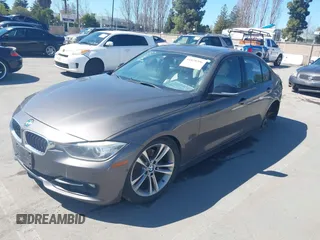 2013 BMW 3 Series 328i with VIN WBA3C1C58DF443711, listed as a IAAI auction lot 41828396 with 81,132 mi miles. Bid and sale history available at carsss.com. Image 2.