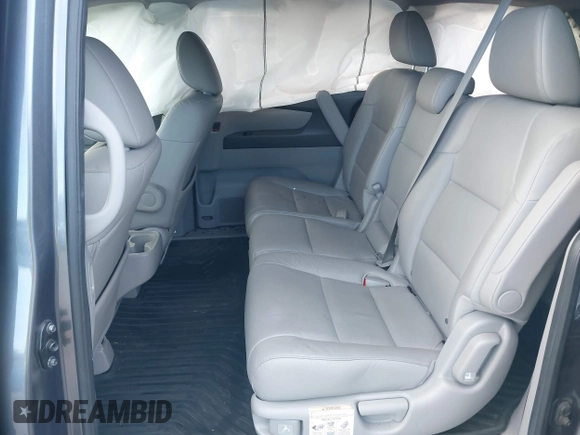 2014 Honda Odyssey EX-L with VIN 5FNRL5H67EB073640, listed as a IAAI auction lot 41115124 with 99,841 mi miles and . Bid and sale history available at carsss.com. Image 8.