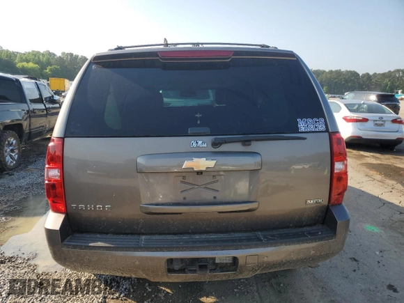 2011 Chevrolet Tahoe LS with VIN 1GNSCAE00BR395849, listed as a Copart auction lot 54750685 with 183,336 mi miles and Salvage title. Bid and sale history available at DreamBid. Image 6.