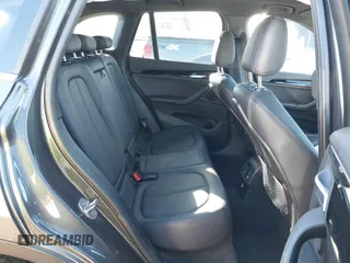 2017 BMW X1 sDrive28i with VIN WBXHU7C30H5H32753, listed as a IAAI auction lot 41441791 with 100,072 mi miles. Bid and sale history available at carsss.com. Image 8.