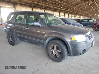 2006 Ford Escape XLS with VIN 1FMYU02ZX6KC49160, listed as a Copart auction lot 77269514 with 189,984 mi miles and Salvage Title. Bid and sale history available at carsss.com. Image 4.