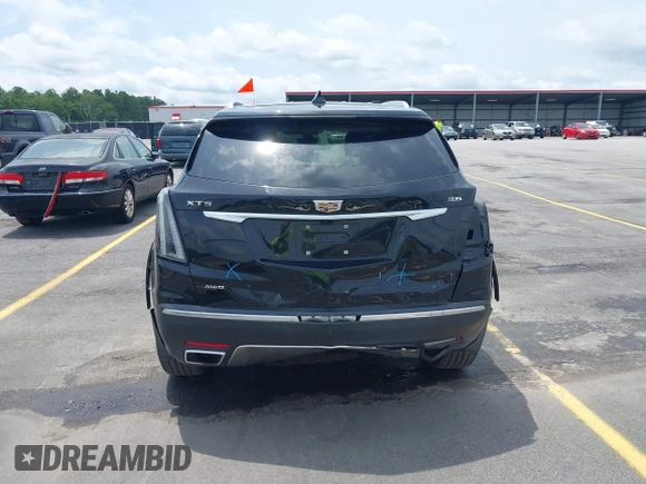 2017 Cadillac XT5 Platinum AWD z VIN 1GYKNFRS9HZ125677, wystawiony jako IAAI lot #42366784 z przebiegiem 152 116 mil mil oraz . Historia ofert i sprzedaży dostępna na DreamBid. Obrazek 17.