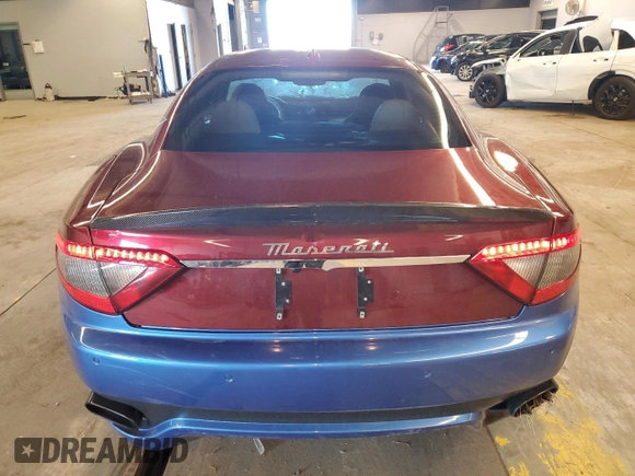 2013 Maserati GranTurismo Sport with VIN ZAM45VLA1D0073304, listed as a Copart auction lot 77509974 with 76,038 mi miles and Salvage title. Bid and sale history available at DreamBid. Image 6.