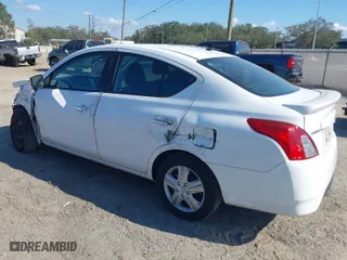 2017 Nissan Versa Sedan SV with VIN 3N1CN7AP9HL863206, listed as a IAAI auction lot 41531239 with 217,425 mi miles. Bid and sale history available at carsss.com. Image 3.