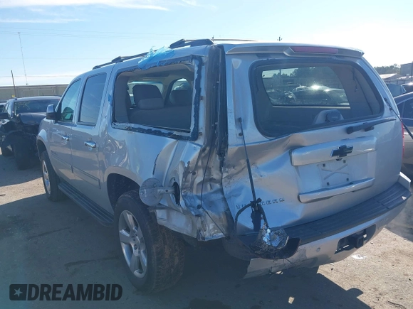 2014 Chevrolet Suburban LT with VIN 1GNSCJE0XER131638, listed as a IAAI auction lot 41305777 with 200,962 mi miles. Bid and sale history available at carsss.com. Image 3.