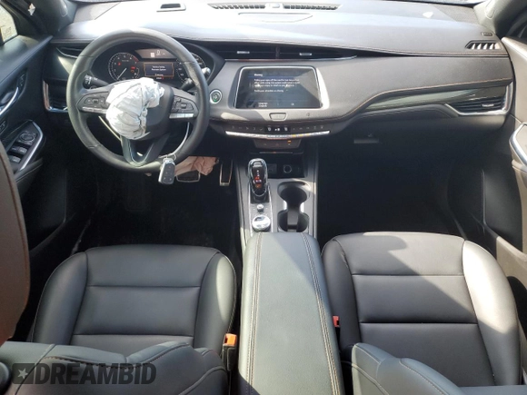 2021 Cadillac XT4 FWD Sport with VIN 1GYFZER44MF080872, listed as a Copart auction lot 86344534 with 23,865 mi miles and Salvage Title. Bid and sale history available at DreamBid. Image 8.