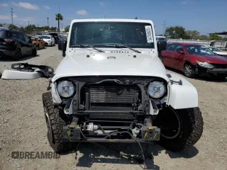 2015 Jeep Wrangler Unlimited Rubicon with VIN 1C4BJWFG6FL508493, listed as a Copart auction lot 54788635 with 127,694 mi miles and Salvage title. Bid and sale history available at DreamBid. Image 5.