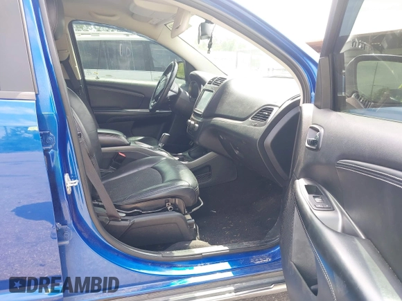 2015 Dodge Journey Crossroad with VIN 3C4PDCGG9FT617772, listed as a IAAI auction lot 42123413 with 146,778 mi miles and . Bid and sale history available at DreamBid. Image 5.