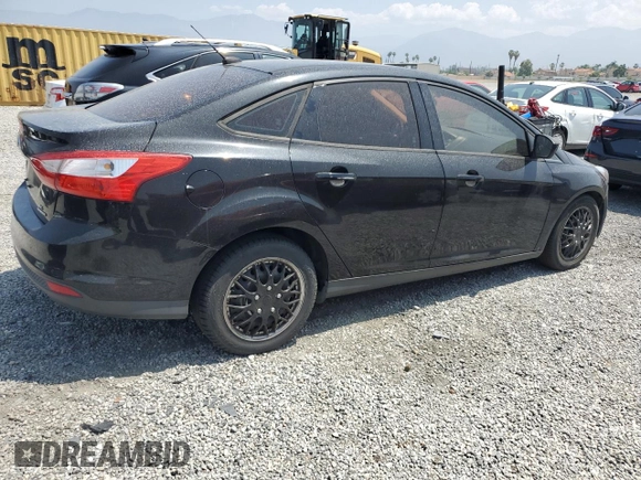 2012 Ford Focus SE with VIN 1FAHP3F22CL372232, listed as a Copart auction lot 59637645 with 134,337 mi miles and Salvage title. Bid and sale history available at DreamBid. Image 3.