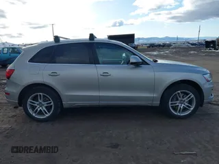 2014 Audi Q5 Premium Plus with VIN WA1CMAFP6EA063529, listed as a IAAI auction lot 41705364 with 154,501 mi miles and . Bid and sale history available at DreamBid. Image 14.