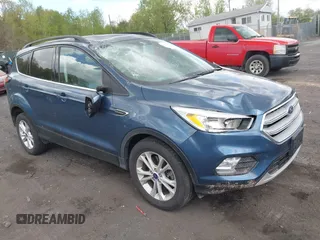 2018 Ford Escape SE z VIN 1FMCU9GD5JUC25602, wystawiony jako IAAI lot #42184308 z przebiegiem 76 045 mil mil oraz . Historia ofert i sprzedaży dostępna na DreamBid. Obrazek 1.