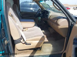 1999 Dodge Ram 1500 with VIN 3B7HC13Y0XG169104, listed as a IAAI auction lot 41936221 with 183,546 mi miles. Bid and sale history available at carsss.com. Image 5.