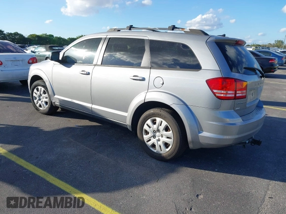 2016 Dodge Journey SE with VIN 3C4PDCAB2GT194810, listed as a IAAI auction lot 41559149 with 104,551 mi miles and . Bid and sale history available at DreamBid. Image 3.