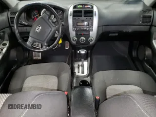 2007 Kia Spectra with VIN KNAFE161775007569, listed as a Copart auction lot 86778784 with 125,463 mi miles and Salvage Title. Bid and sale history available at carsss.com. Image 8.