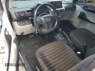 2013 Scion iQ z VIN JTNJJXB08DJ023545, wystawiony jako Copart lot #53999025 z przebiegiem 149 895 mil mil oraz Szkoda całkowita • Salvage title. Historia ofert i sprzedaży dostępna na DreamBid. Obrazek 8.