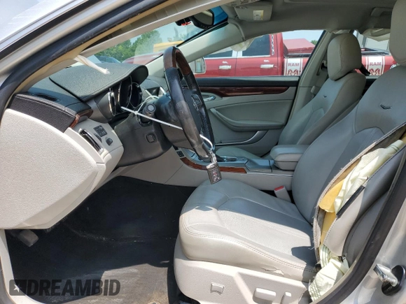 2012 Cadillac CTS Premium z VIN 1G6DP5E37C0115103, wystawiony jako Copart lot #58911645 z przebiegiem 143 106 mil mil oraz Szkoda całkowita • Salvage title. Historia ofert i sprzedaży dostępna na DreamBid. Obrazek 7.