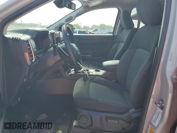 2024 Ford Ranger XLT with VIN 1FTER4GH7RLE74280, listed as a Copart auction lot 57282575 with 5,423 mi miles and Salvage title. Bid and sale history available at DreamBid. Image 7.