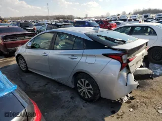 2021 Toyota Prius L Eco with VIN JTDKAMFU3M3147845, listed as a Copart auction lot 88705855 with 59,418 mi miles and Salvage Title. Bid and sale history available at carsss.com. Image 2.