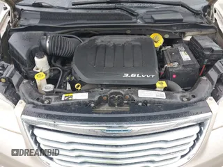 2014 Chrysler Town & Country Touring with VIN 2C4RC1BG2ER212233, listed as a IAAI auction lot 41836648 with 105,034 mi miles. Bid and sale history available at carsss.com. Image 10.
