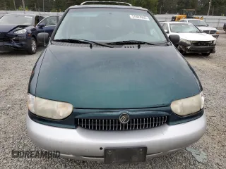 1999 Mercury Villager z VIN 4M2XV11T0XDJ36155, wystawiony jako Copart lot #57083065 z przebiegiem Nie podano mil oraz Szkody całkowita. Historia ofert i sprzedaży dostępna na DreamBid. Obrazek 5.