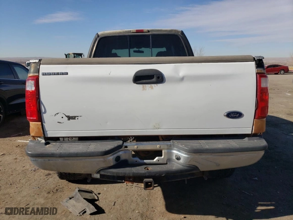 2000 Ford Super Duty F-250 XL with VIN 1FTNW21F7YED69598, listed as a Copart auction lot 84757704 with 277,570 mi miles and Salvage Title. Bid and sale history available at carsss.com. Image 6.