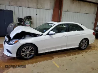 2014 Mercedes-Benz E 400 Sport with VIN WDDHF9FBXEA936424, listed as a Copart auction lot 83331224 with 194,689 mi miles and Salvage Title. Bid and sale history available at DreamBid. Image 1.