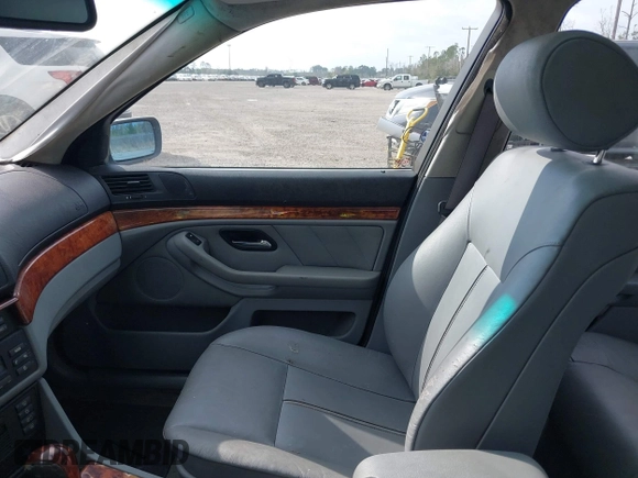 2000 BMW 5 Series 528iA with VIN WBADM6344YGU22084, listed as a IAAI auction lot 41734099 with 249,650 mi miles. Bid and sale history available at carsss.com. Image 5.