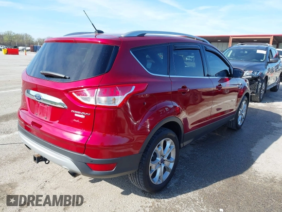 2015 Ford Escape Titanium with VIN 1FMCU9J97FUB57833, listed as a IAAI auction lot 41894505 with 176,975 mi miles. Bid and sale history available at carsss.com. Image 4.