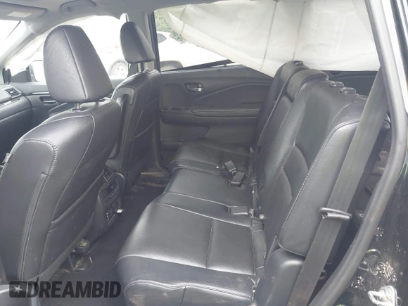 2017 Honda Pilot Touring with VIN 5FNYF6H93HB028122, listed as a IAAI auction lot 42130116 with 109,318 mi miles and . Bid and sale history available at DreamBid. Image 8.