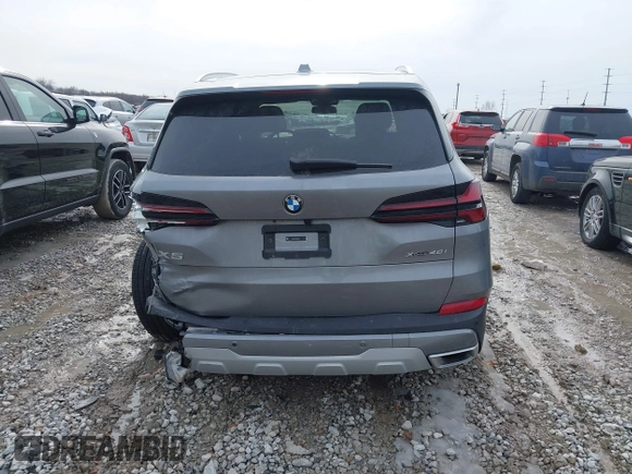 2025 BMW X5 xDrive40i with VIN 5UX23EU02S9X44610, listed as a IAAI auction lot 41469794 with 1,964 mi miles. Bid and sale history available at carsss.com. Image 17.