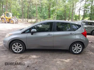 2014 Nissan Note SV z VIN 3N1CE2CP2EL376683, wystawiony jako IAAI lot #42123277 z przebiegiem 144 171 mil mil oraz . Historia ofert i sprzedaży dostępna na DreamBid. Obrazek 14.