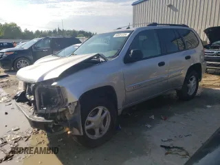2005 GMC Envoy SLE z VIN 1GKDT13S552122428, wystawiony jako Copart lot #68651224 z przebiegiem 111 931 mil mil oraz Szkody całkowita. Historia ofert i sprzedaży dostępna na DreamBid. Obrazek 1.