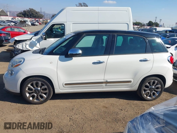 2014 FIAT 500L Lounge with VIN ZFBCFACH9EZ004041, listed as a IAAI auction lot 41366234 with 106,769 mi miles and . Bid and sale history available at DreamBid. Image 14.
