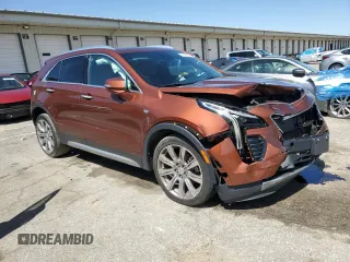 2019 Cadillac XT4 AWD Premium Luxury with VIN 1GYFZDR42KF214298, listed as a Copart auction lot 52489875 with 63,338 mi miles and Salvage title. Bid and sale history available at DreamBid. Image 4.