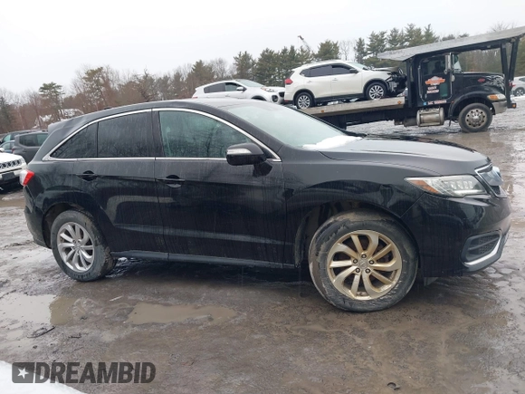 2016 Acura RDX with VIN 5J8TB4H38GL015305, listed as a IAAI auction lot 41672385 with 121,623 mi miles. Bid and sale history available at carsss.com. Image 13.