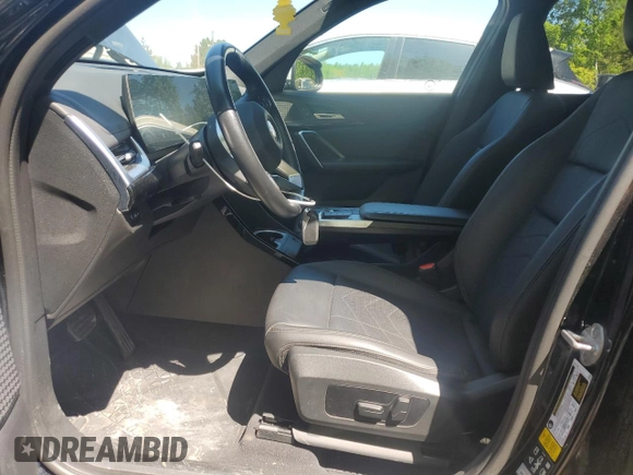 2023 BMW X1 xDrive28i with VIN WBX73EF04P5X86962, listed as a Copart auction lot 57575815 with 95,965 mi miles and Salvage title. Bid and sale history available at DreamBid. Image 7.
