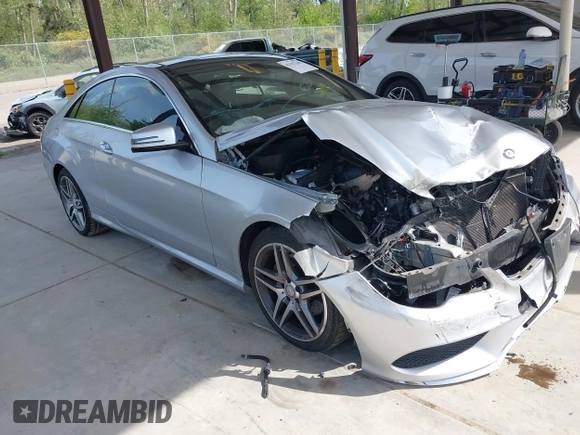 2016 Mercedes-Benz E 400 with VIN WDDKJ6HB6GF328700, listed as a IAAI auction lot 42157340 with 125,183 mi miles and . Bid and sale history available at DreamBid. Image 1.
