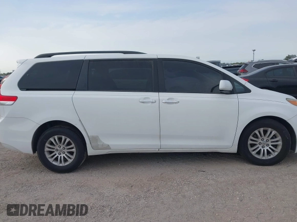 2011 Toyota Sienna XLE AAS with VIN 5TDYK3DC8BS108689, listed as a IAAI auction lot 42308965 with 179,524 mi miles and . Bid and sale history available at DreamBid. Image 13.